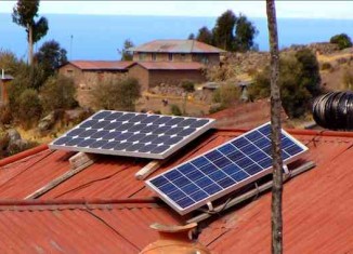 solar panels on Peruvian shack-Julia Manzerova-CC-Flickr