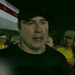 travolta-flies-to-haiti.jpg