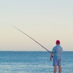 fishing on the beach by Wax115 via Morguefile