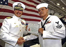 Navy machinist receives citizenship certificate aboard Navy ship