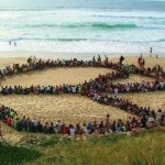 Peace sign on beach