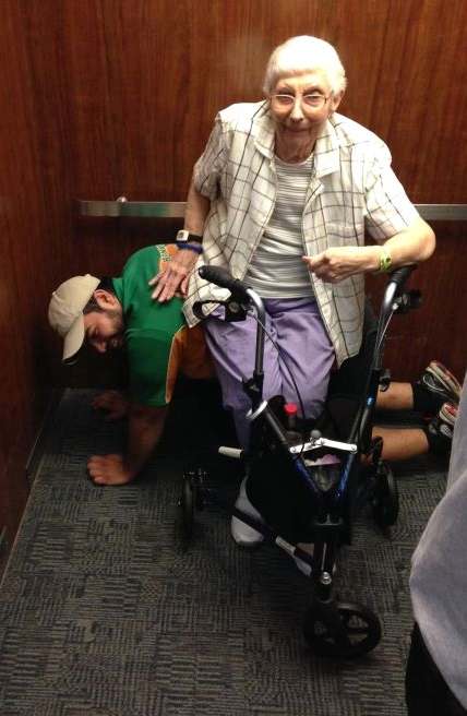 Man Acts as Human Bench for Elderly Lady Stuck on Elevator - Good