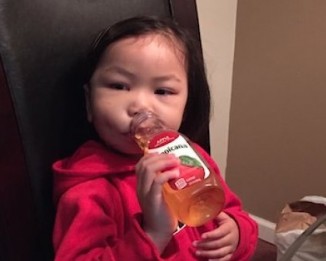 After surgery, Kaitlin Nguygen enjoys juice